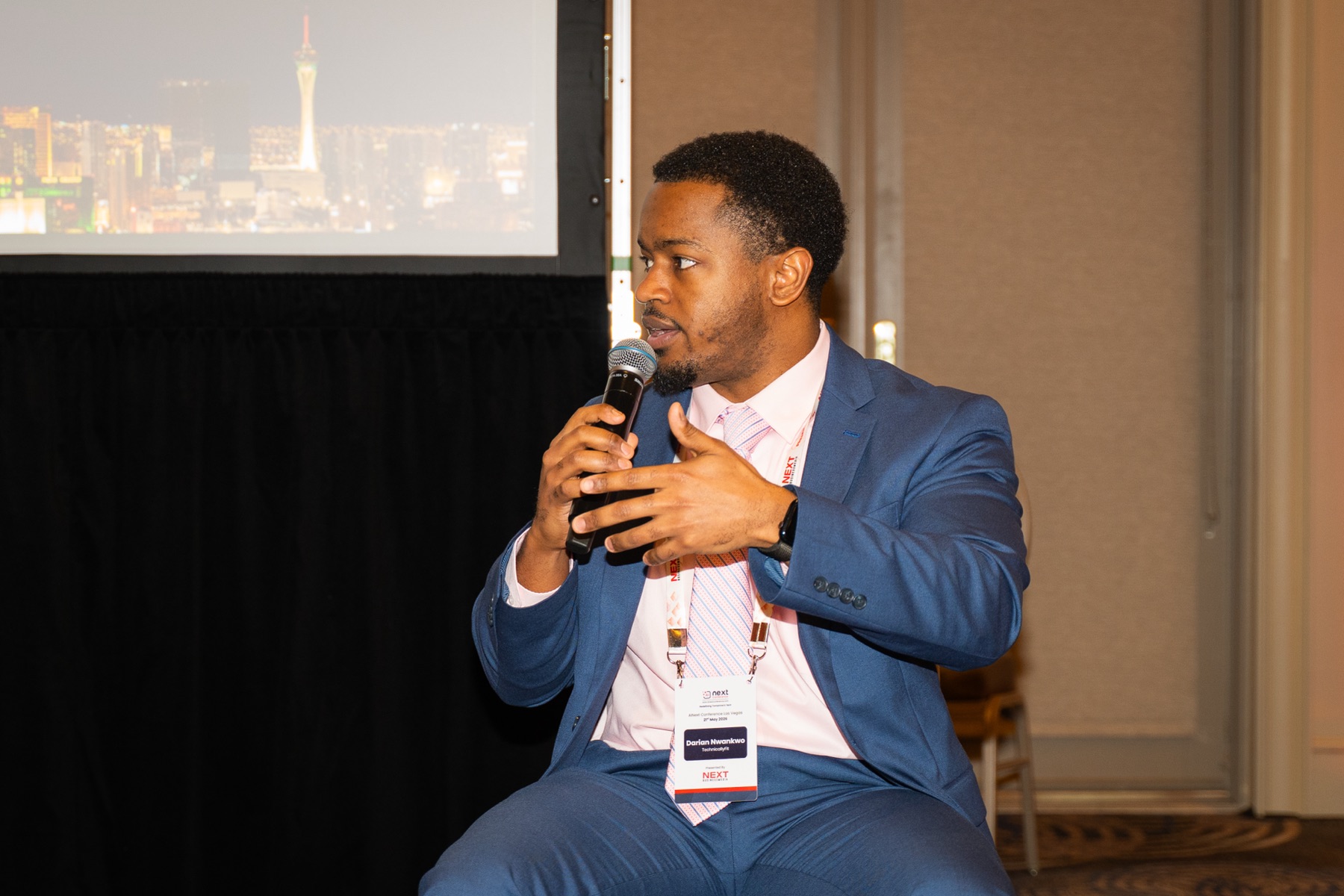 Darian Nwankwo speaking on a panel at the AI Next Conference in Las Vegas